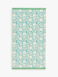 Land Shore floral blue bath towel with red and green trim, UK version