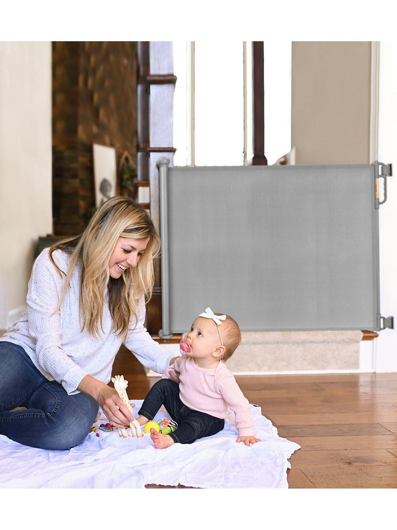 Momcozy retractable baby gate for openings up to 55 inches, imported from the UK