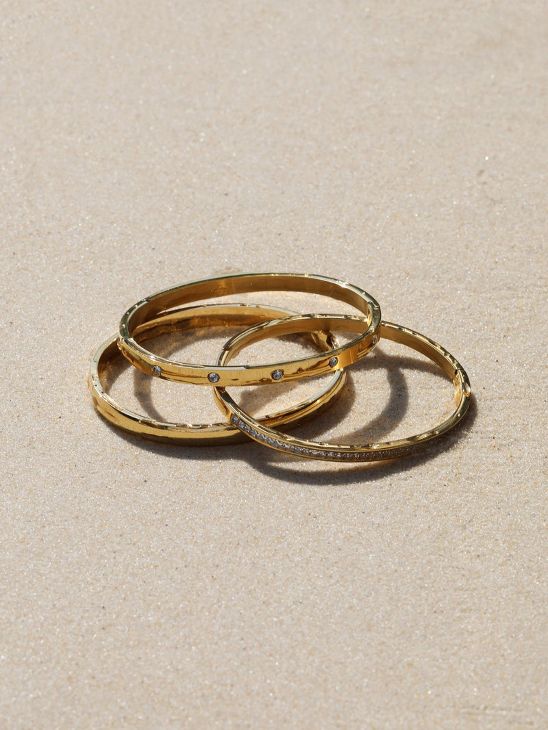 Jon Richard waterproof polished crystal bangle in gold, UK version