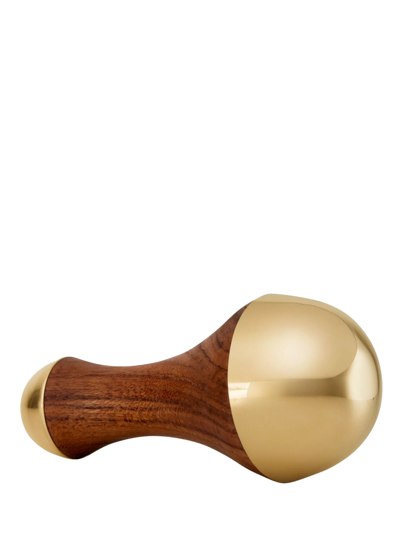 Kama Ayurveda Kansa Wand facial massage tool with dual bronze domes, UK version