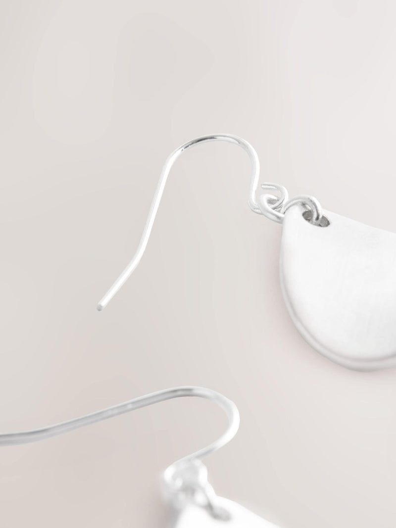 Silver tone petal drop earrings (British brand)