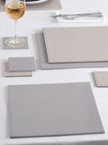 Set of 4 natural reversible faux leather placemats and coasters (British brand)
