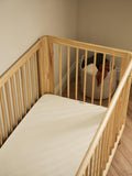 The Little Green Sheep waterproof cotbed mattress protector (British brand)