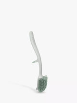 Dish Brush with Integrated Sink Rest and Variable Stiffness Bristles