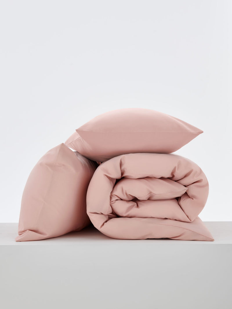 Pink polycotton duvet cover and pillowcase set, imported from the UK