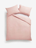 Pink polycotton duvet cover and pillowcase set, imported from the UK