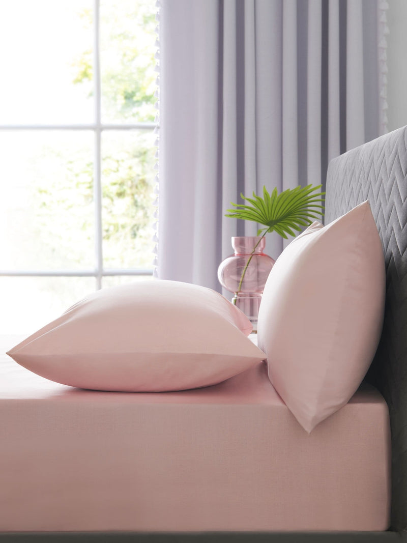 Pink easy-care polycotton fitted sheet, imported from the UK