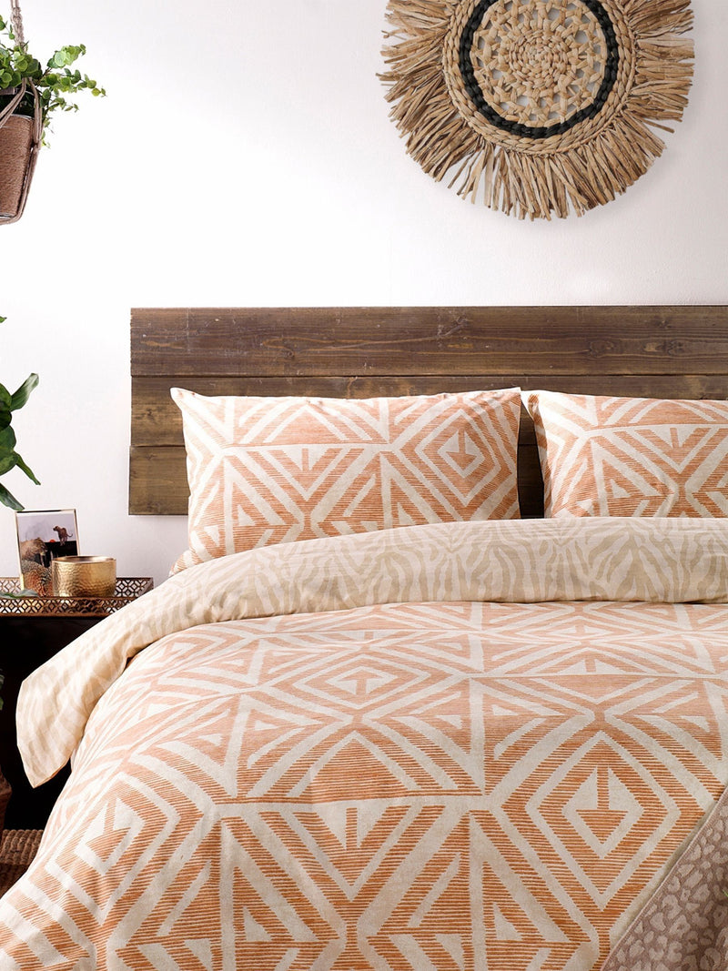 Terracotta orange reversible duvet cover set with Tanza design - British product