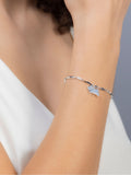 Radley ladies silver tone jumping dog charm bracelet, imported from the UK