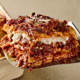 Pasta Evangelists beef lasagne ready meal 385g, imported from the UK