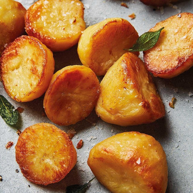 M&S roasting potatoes basted in butter 450g, imported from the UK