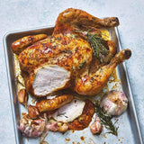 M&S garlic and herb whole chicken 1.55kg, imported from the UK