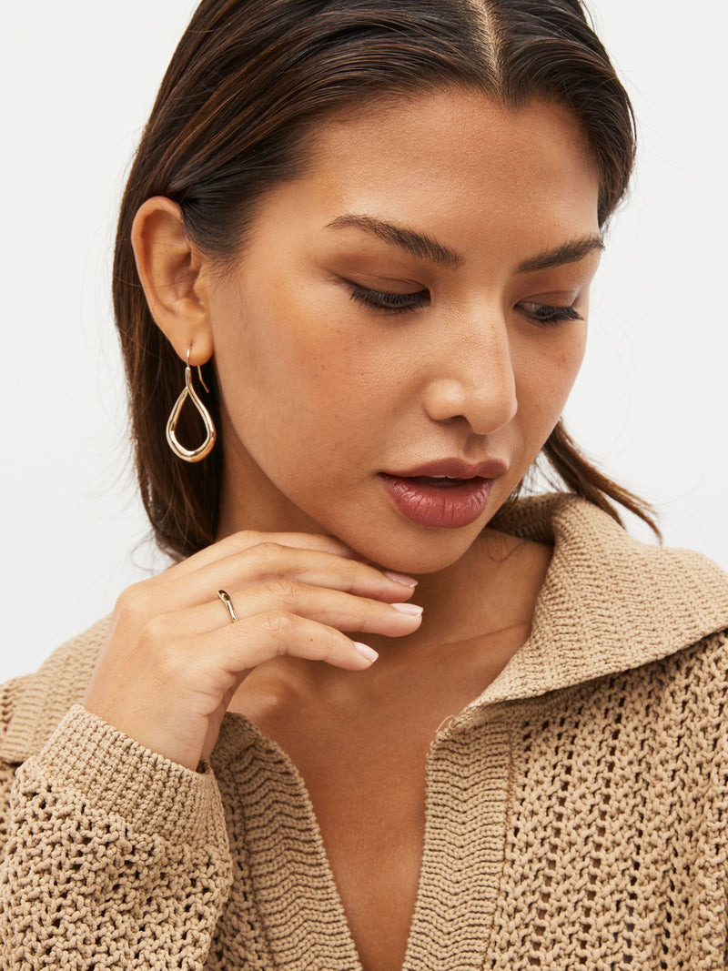 Gold tone tear drop earrings, UK version