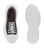 Alexander McQueen Tread Slick sneakers, imported from the UK
