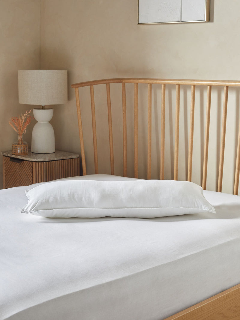 Small bolster feels like down pillow (British brand)