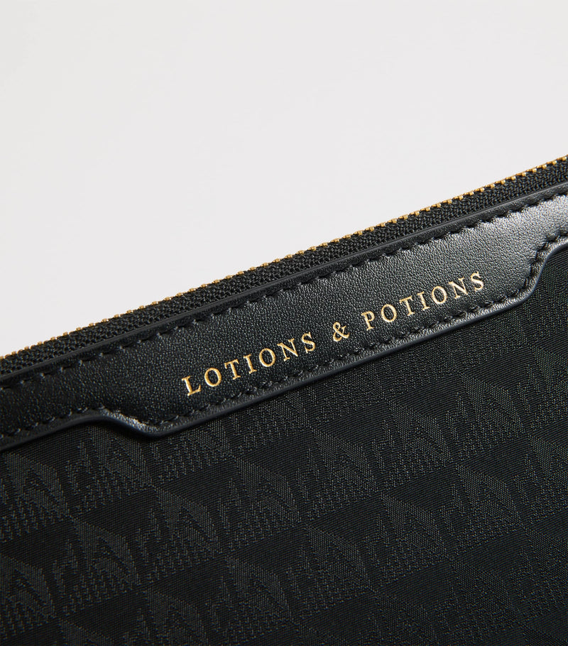 Anya Hindmarch Jacquard Logo Lotions and Potions travel pouch - British product