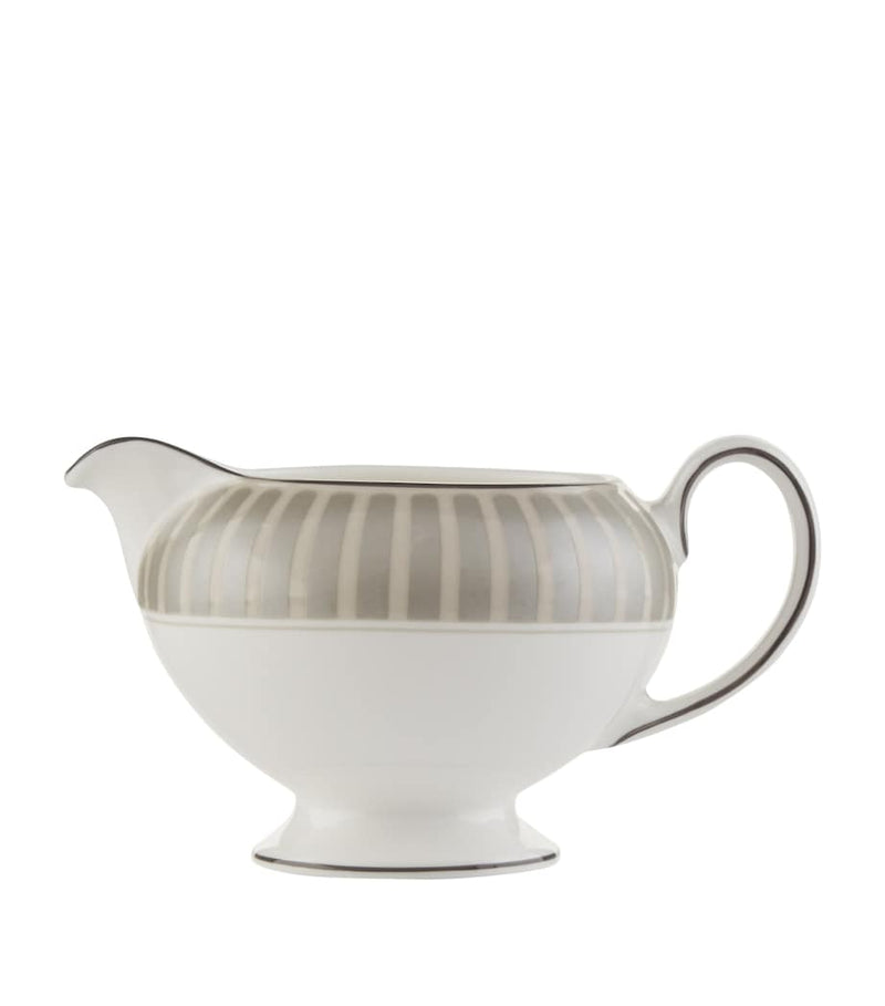 Wedgwood elegant striped cream jug with gilded trim (British brand)