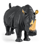 Lladró porcelain rhino figurine with gold accents, 22cm high, UK version