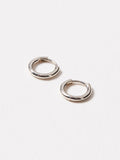 Oliver Bonas silver tone juniper mini huggie earrings, imported from the UK