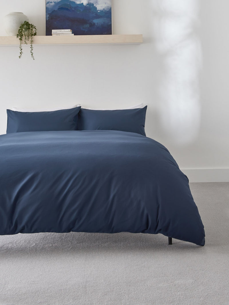 Navy blue polycotton duvet cover and pillowcase set, imported from the UK