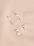 Silver tone initial stud earrings pack (British brand)