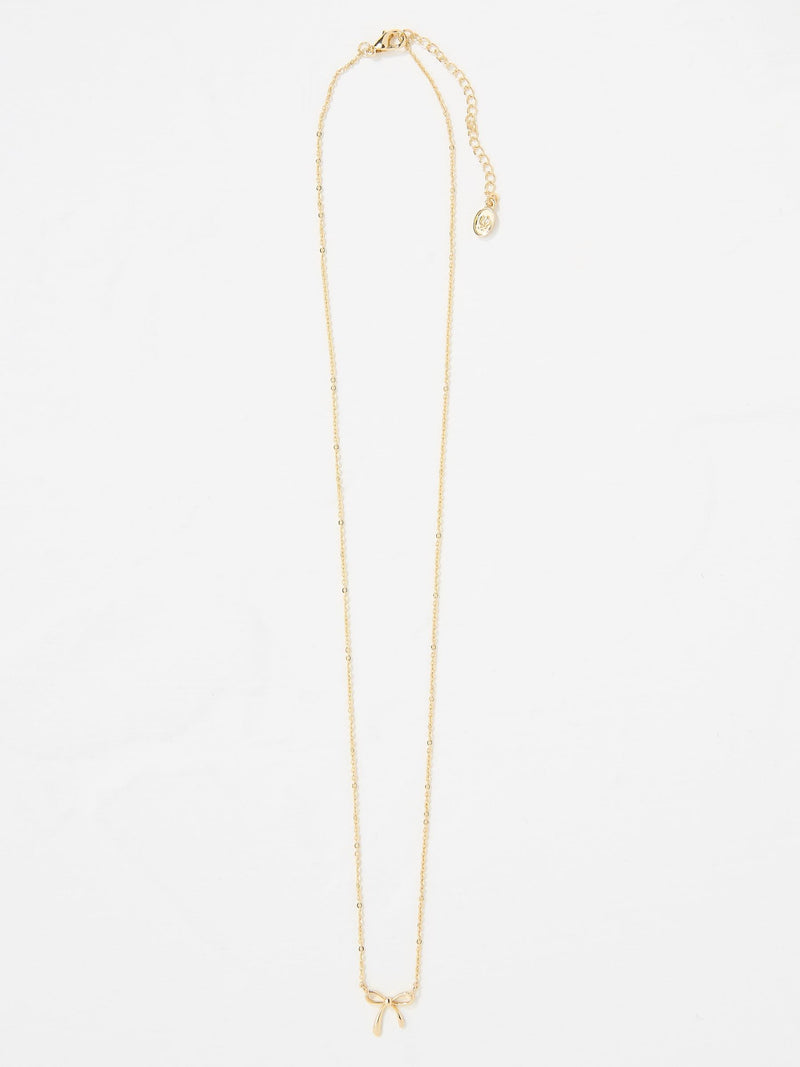 FatFace Gold Tone Bow Pendant Necklace