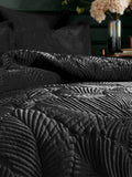 Paoletti Black Palmeria quilted velvet duvet cover set, imported from the UK
