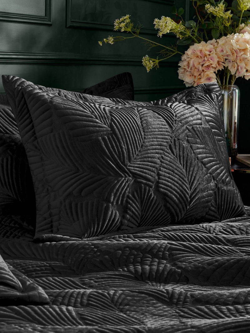 Paoletti Black Palmeria quilted velvet duvet cover set, imported from the UK