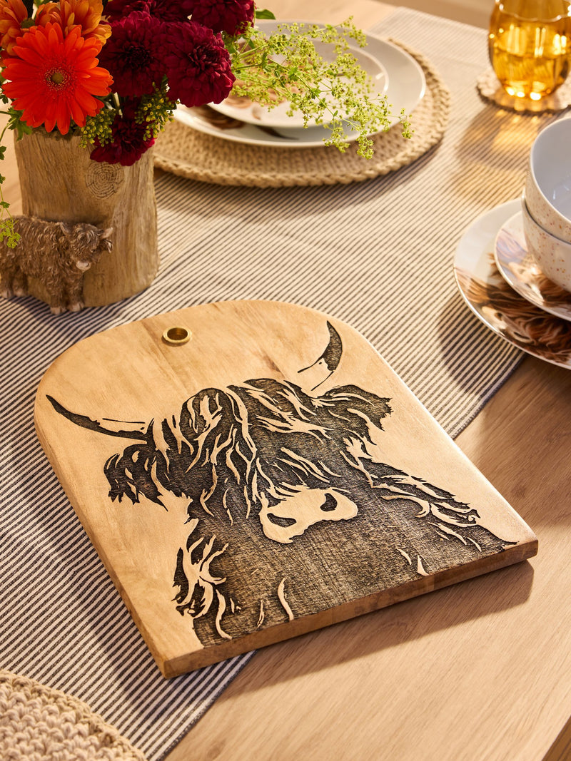 Wooden serving board with Hamish the Highland Cow design 27x34cm, imported from the UK