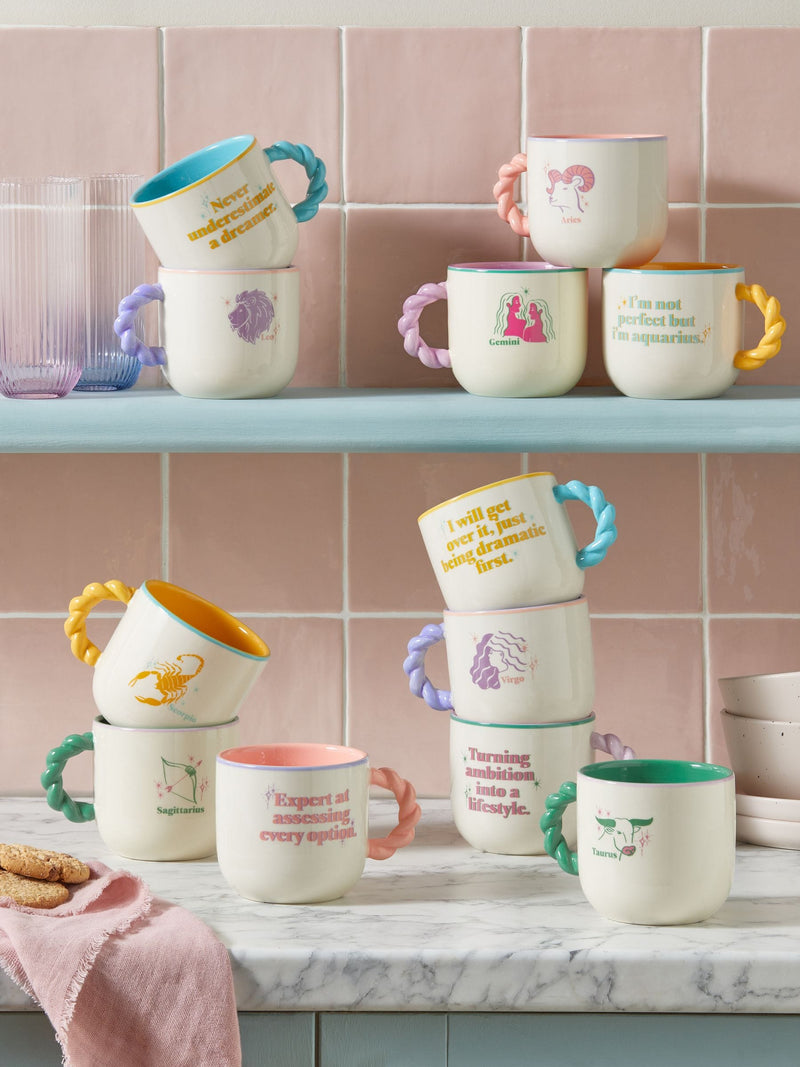 Horoscope mug with twisted handles and slogans, imported from the UK