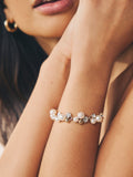Gold tone sparkle pearl effect pully bracelet, UK version