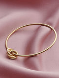 Posh Totty Designs gold tone bangle 6.5cm diameter, imported from the UK