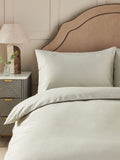 Pale sage green duvet cover and pillowcase set, imported from the UK