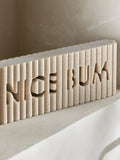 Rib word block ornament with Nice Bum slogan, imported from the UK