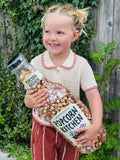 Popcorn Kitchen Giant Money Bottle filled with sweet popcorn, imported from the UK