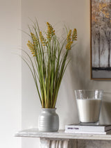 Gallery Home White Faux Potted Grass with Yellow Wildflower Artificial Plant Decoration
