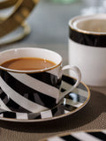 Mikasa black tea cups saucers set of 4, imported from the UK