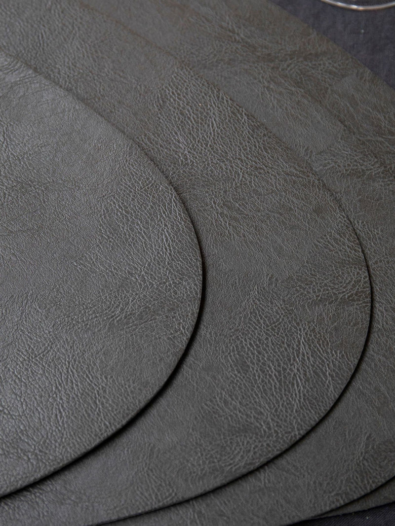 Mikasa black pebble-shaped faux leather placemat set of 4, imported from the UK