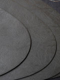 Mikasa black pebble-shaped faux leather placemat set of 4, imported from the UK