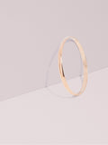 Kate Spade rose gold tone idiom bangle, UK version