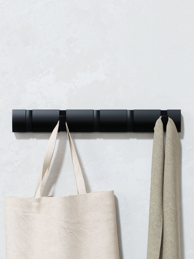 Umbra wall mounted coat rack with retractable hooks (British brand)