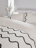 Monochrome tufted wave duvet cover and pillowcase set, imported from the UK