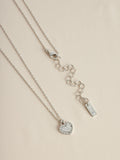 Silver tone heart initial necklace (British brand)