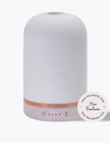 NEOM Wellbeing Pod aromatherapy diffuser with ceramic cover and wood base (British brand)