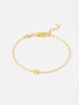 Oliver Bonas Gold Tone Milo Paw Print Charm Bracelet