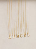 Inicio E Initial Pendant with mother-of-pearl and 17-inch chain, UK version