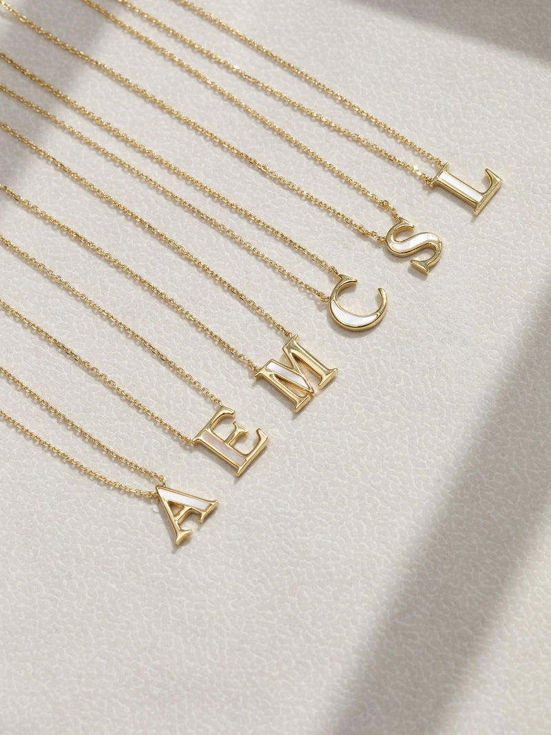 Inicio E Initial Pendant with mother-of-pearl and 17-inch chain, UK version