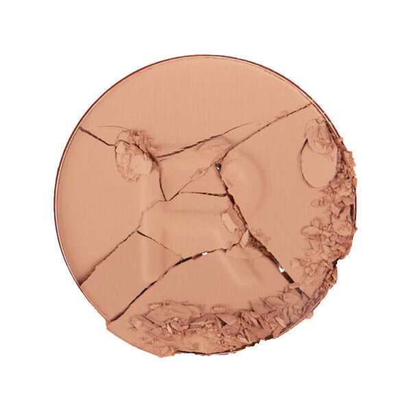 Revolution Reloaded pressed powder beige shade, imported from the UK