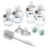 Tommee Tippee Natural Start Newborn Starter Set, 2 Anti-Colic Baby Bottles, Medium-Flow, Breast-Like Teats, Self-Sterilising Baby Accessories & Cleaning Boots