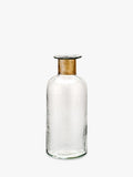 Nkuku Chara hammered glass bottle vase in Clear, imported from the UK